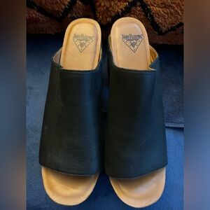 I am selling John Fluevog high heeled clogs.  I absolutely love these.